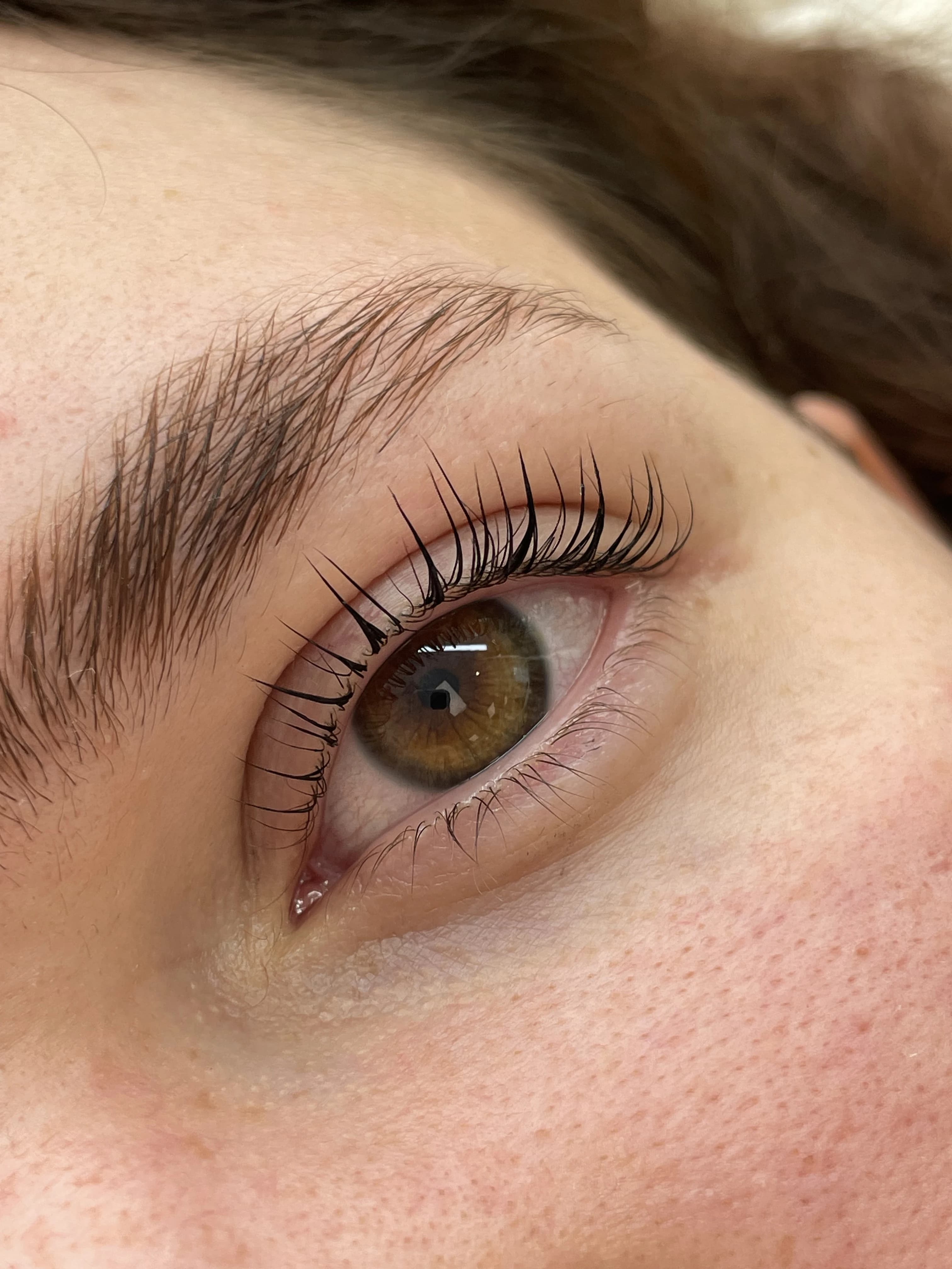 Lash lift and tint on hazel eyes with dark curled upper and lower lashes at My Beauty Space Mississauga.
